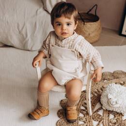 Barboteuse à bretelles bébé "Eden" évolutive en velours coton BIO côtelé écru milk