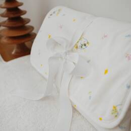 Matelas à langer de voyage en éponge et tissu imprimé