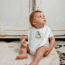 Bavoir brodé en éponge doublé velours