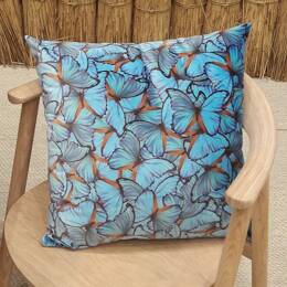 Coussin velours papillons turquoise