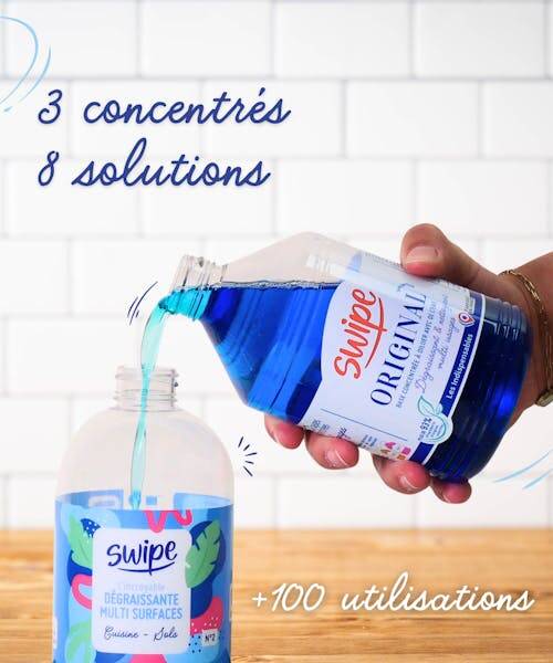 Une personne en train de préparer un produit d'entretien multi-usages, français et ultra-concentré Swipe.