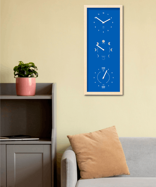 Horloge Triskèle fabriquée en France par Horloges des Marées avec  l’heure, les marées et la Lune.