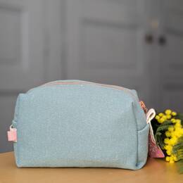 Trousse de beauté en jersey bleu pailleté