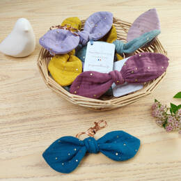 Porte-clé à pois dorés