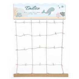 Pêle-mêle mer et poissons : une déco utile et pas chère pour accueillir bébé