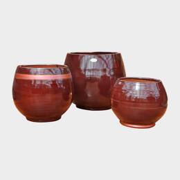 Pot rond large et profond sur plateforme Bahia marron rose cuivré