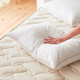 Oreiller gonflant et moelleux effet duvet - Matelas No Stress